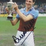 alvin martin with trophy